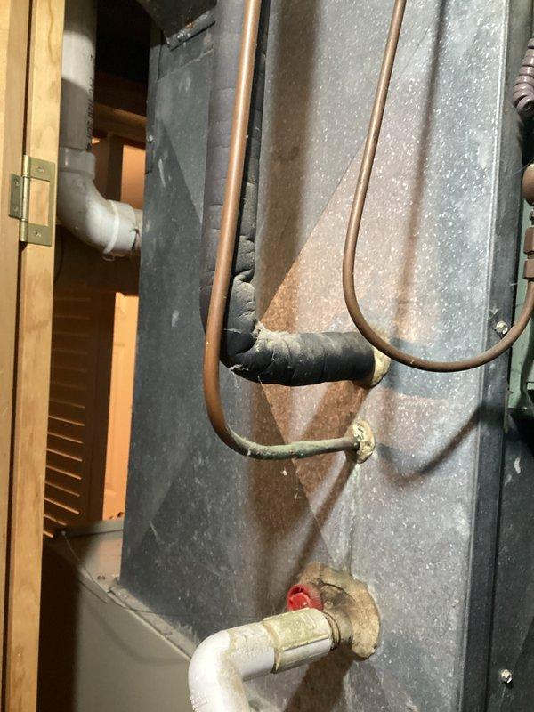 Completed comprehensive replacement estimate for aging HVAC system exceeding 10 years of service life. Documented existing air handler unit installation in utility closet, noting current operational status, refrigerant line configuration with deteriorating insulation, and condensate drainage system with visible moisture staining on equipment cabinet. Verified all customer contact information and captured photographic documentation of equipment condition to support replacement recommendations.