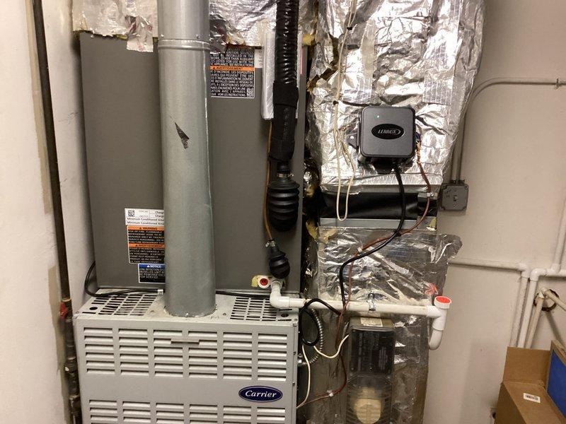 Completed installation of Lennox air conditioning system for commercial customer. Unit was properly positioned, leveled, and secured with all electrical connections completed to manufacturer specifications. System was tested and verified operational upon completion.