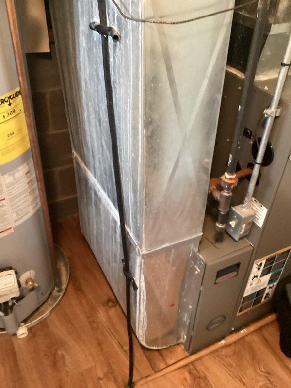 Completed comprehensive HVAC system replacement estimate for residential property. Assessed existing Lennox furnace and air handler installation in utility closet, documenting current equipment configuration including condensate drain lines, copper refrigerant lines, gas connections, and electrical components. Photographed equipment layout, clearances, and mechanical room conditions to provide accurate replacement specifications and system sizing recommendations.
