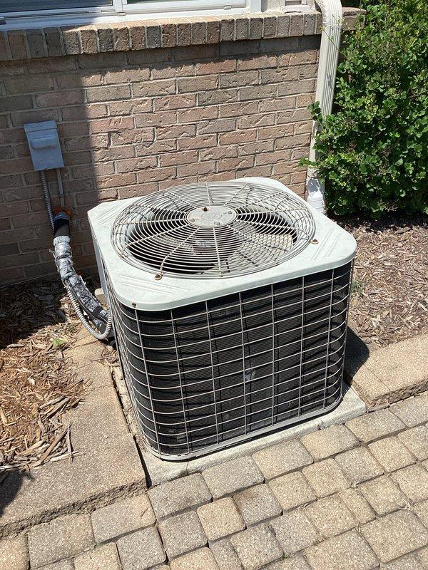 Evaluated 26-year-old residential air conditioning system experiencing inadequate cooling performance. Inspected outdoor condenser unit located on concrete paver patio and interior air handler components including PVC condensate drain lines. Due to age of equipment and cooling deficiency, provided comprehensive replacement estimate for complete HVAC system upgrade to restore proper climate control functionality.