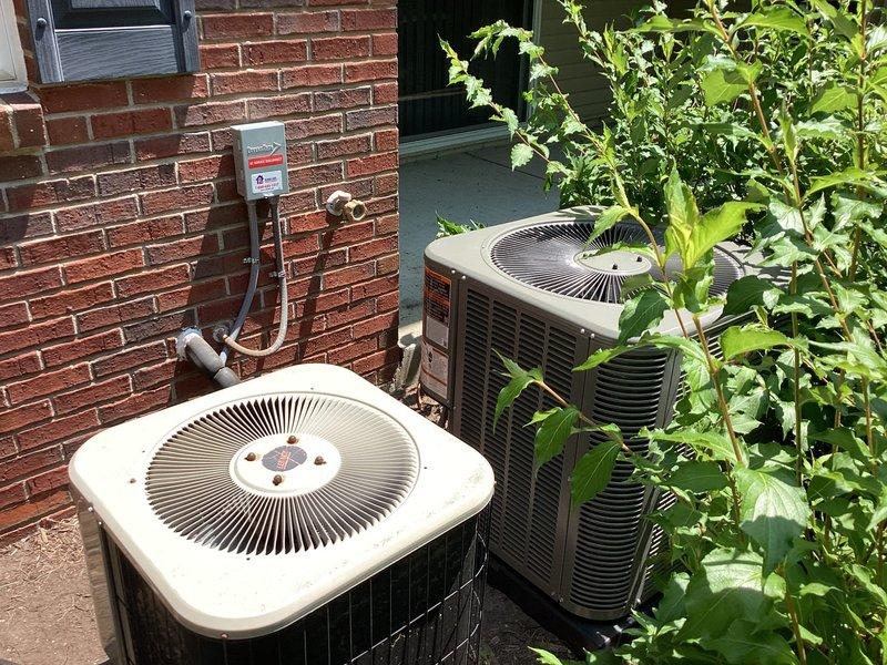 Completed installation of new Lennox air conditioning system including outdoor condensing unit and indoor air handler with associated ductwork connections. Connected refrigerant lines, electrical service, and condensate drainage; verified proper system operation and airflow throughout. Payment collected upon successful completion of installation.