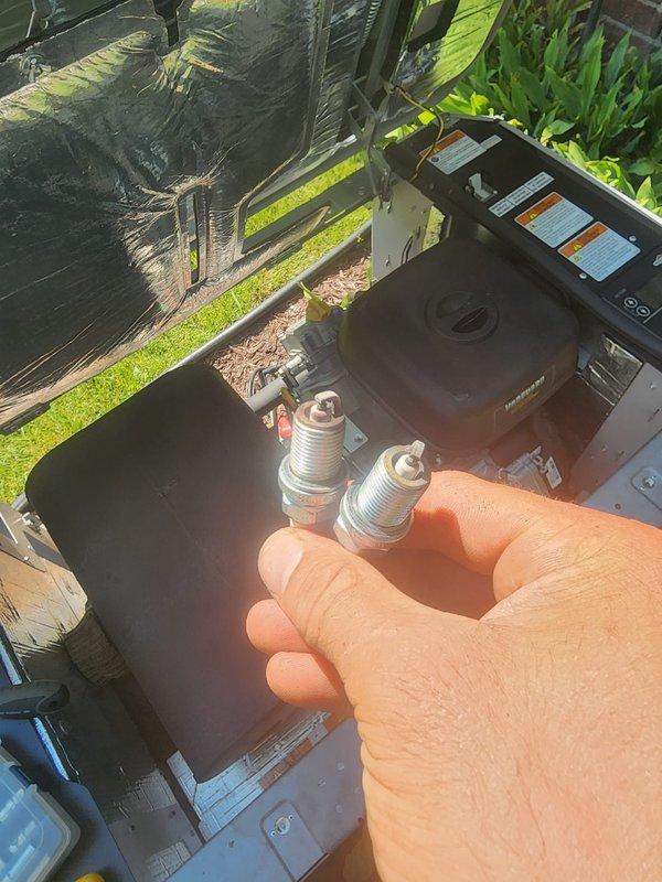 Performed scheduled maintenance on Vanguard generator following extended runtime of four consecutive days. Conducted comprehensive inspection of all critical components including gas valve assembly, ignition system, and electrical connections. Removed and replaced spark plugs showing wear from prolonged operation. Inspected Honeywell gas valve for proper function and verified all wire connections were secure. Cleaned debris and pine needles from equipment compartment. Verified all safety labels and specifications were legible. Unit tested successfully and returned to standby mode ready for next activation cycle.