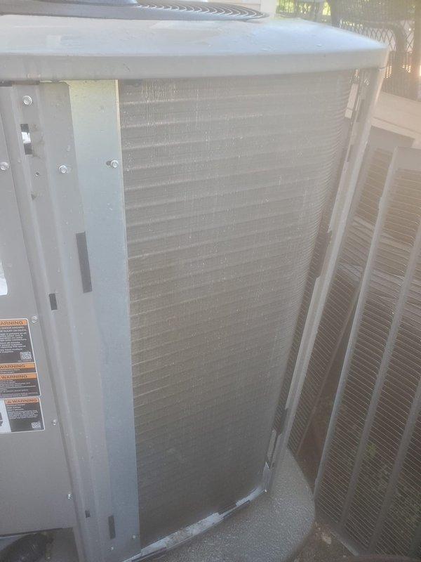 Completed preventative maintenance service on two residential air conditioning systems under Worry Free Service Agreement. Performed comprehensive inspection, cleaning, and testing of both outdoor condensing units. First unit showed accumulated dirt and debris on condenser coil fins; cleaned coils to restore proper airflow and heat transfer efficiency. Second Lennox unit exhibited overgrown vegetation around base affecting clearance requirements; cleared grass and weeds from perimeter to ensure adequate ventilation and prevent airflow restriction. Inspected electrical components, refrigerant lines, and fan assemblies on both systems. Verified proper operation of compressors, condenser fans, and safety controls. All systems tested and left operating within normal parameters.