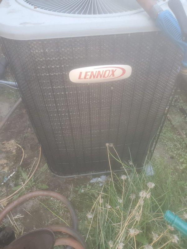 Completed preventative maintenance service on two residential air conditioning systems under Worry Free Service Agreement. Performed comprehensive inspection, cleaning, and testing of both outdoor condensing units. First unit showed accumulated dirt and debris on condenser coil fins; cleaned coils to restore proper airflow and heat transfer efficiency. Second Lennox unit exhibited overgrown vegetation around base affecting clearance requirements; cleared grass and weeds from perimeter to ensure adequate ventilation and prevent airflow restriction. Inspected electrical components, refrigerant lines, and fan assemblies on both systems. Verified proper operation of compressors, condenser fans, and safety controls. All systems tested and left operating within normal parameters.