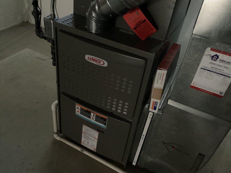 Successfully installed a new 50-gallon tanked water heater in the basement utility area. The installation included proper venting with flexible aluminum ductwork connected to the existing rigid vent system, copper supply line connections with soldered joints, and appropriate positioning adjacent to the existing HVAC equipment. All connections were completed to code specifications, the unit was tested for proper operation, and the installation area was left clean and ready for use.