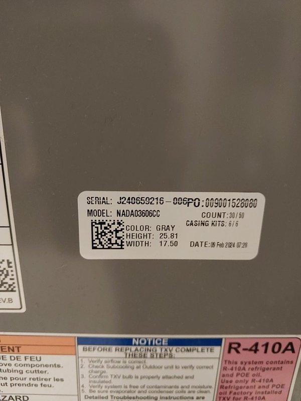 Responded to no cooling complaint on 2024 model Robertshaw thermostat system with NADA036GDCC air handler unit. Upon arrival, verified thermostat display showing 72°F room temperature with system controls accessible. Documented thermostat settings with fan switch in AUTO position and system switch available for COOL/OFF/HEAT operation. Inspected air handler unit and recorded equipment specifications including serial number J240659216, confirming R-410A refrigerant system with proper labeling and documentation present.