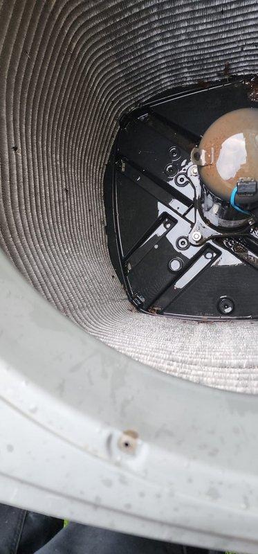 Performed AC tune-up on 9-year-old Trane XR outdoor unit (Model 4TTA3060D1000NA) with customer reporting reduced cooling effectiveness. Inspected system for refrigerant leak using UV dye previously installed during last year's repair, checked all electrical connections and mechanical components, and documented equipment condition with photos of internal ductwork assembly and unit specifications. System evaluated for performance issues and leak detection completed as requested.