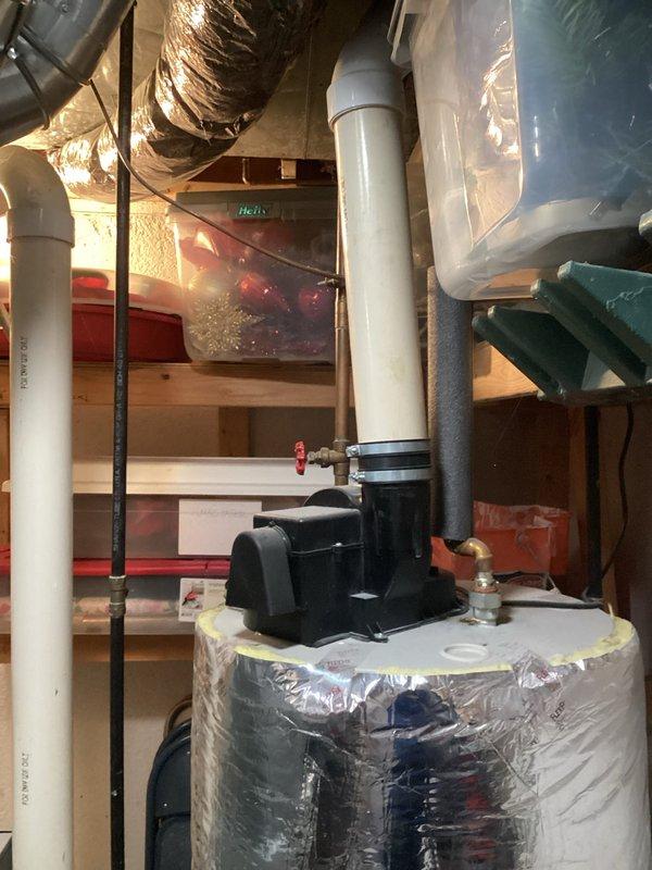 Completed comprehensive estimate for furnace and air conditioning system replacement on 26-year-old equipment. Assessed existing HVAC infrastructure in basement utility area, including ductwork configuration, electrical service panel, and available space for new equipment installation. Documented current system layout with photographs showing metallic rectangular ductwork, electrical components, and mechanical room conditions to provide accurate replacement specifications and installation requirements.