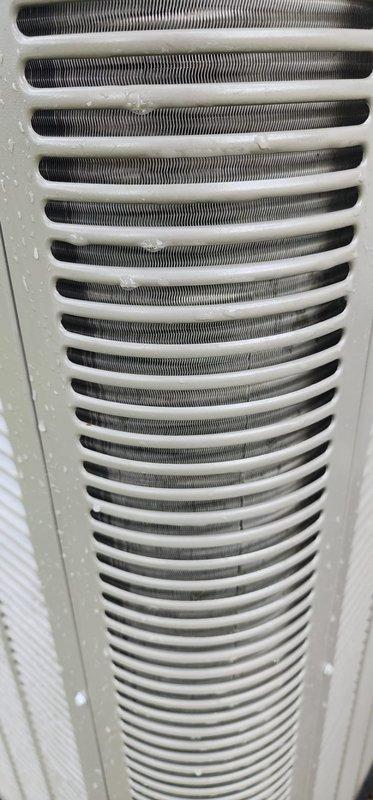 Completed routine AC maintenance on residential split system unit. Inspected outdoor condensing unit compressor, refrigerant lines, and electrical connections, which were found in good operating condition. Observed dust and debris accumulation on condenser coil fins requiring future attention. Verified air return grille and ductwork connections were secure and functioning properly.