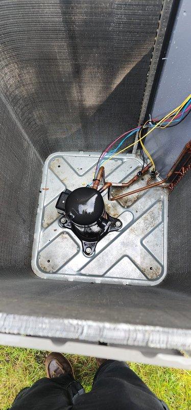 Completed routine AC maintenance on residential split system unit. Inspected outdoor condensing unit compressor, refrigerant lines, and electrical connections, which were found in good operating condition. Observed dust and debris accumulation on condenser coil fins requiring future attention. Verified air return grille and ductwork connections were secure and functioning properly.