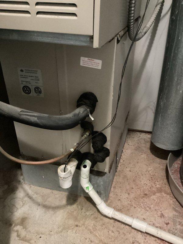 Completed HVAC replacement estimate for residential system. Confirmed account information via text communication and documented existing Lennox furnace installation and water heater configuration in basement mechanical room with photographic records for proposal preparation.
