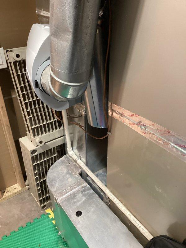 Conducted comprehensive assessment of existing HVAC system that has reached end of service life and experiencing declining performance. System evaluation revealed aging air handler unit and ductwork assembly in basement utility area showing signs of wear and reduced operational efficiency. Documented current installation configuration including vertical metal ductwork, evaporator coil assembly, refrigerant line routing, and existing insulation conditions. Provided detailed replacement estimate for complete system upgrade to restore proper climate control and energy efficiency to the residence.