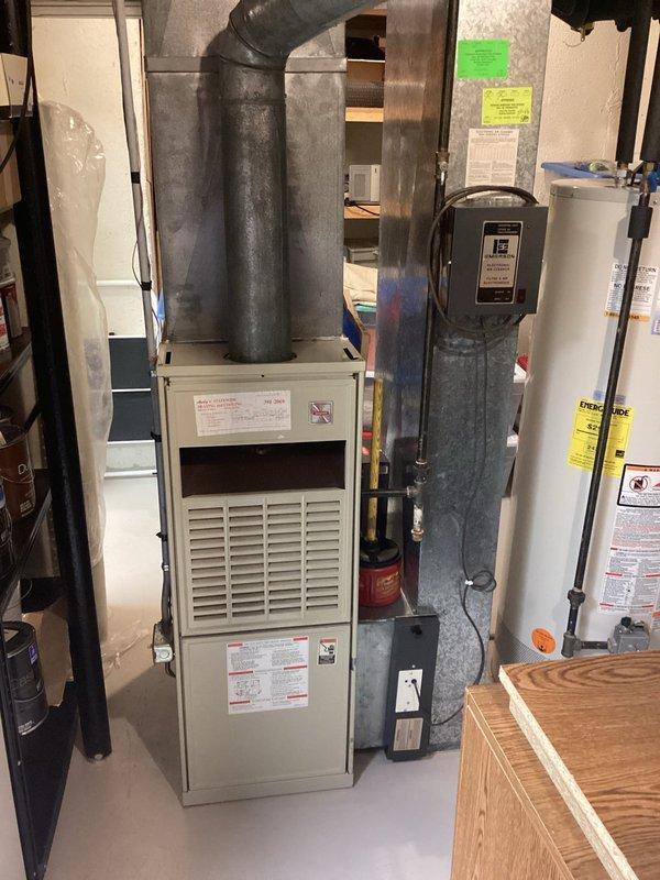 Completed comprehensive HVAC system evaluation for 35-year-old heating and cooling equipment. Both furnace and air conditioning units assessed, with furnace currently operational but AC system showing diminished cooling capacity and struggling to maintain desired temperatures. Provided detailed replacement estimate options for complete HVAC system or AC-only replacement to address aging equipment and inadequate cooling performance.