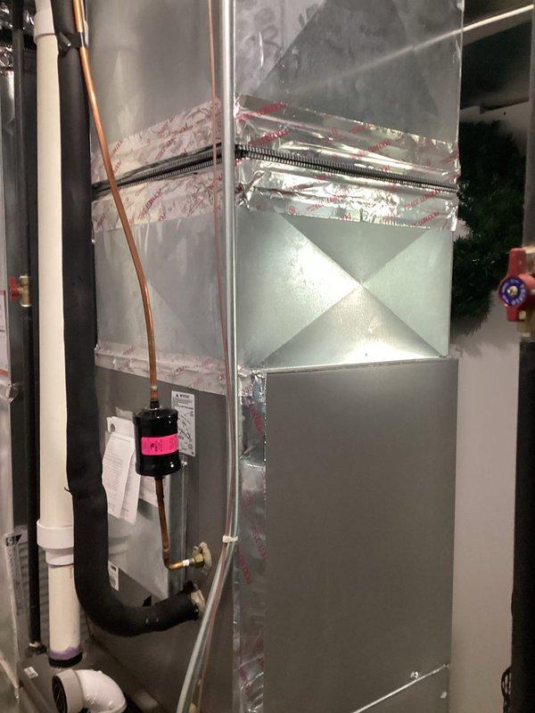 Completed estimate for replacement of 13-year-old air conditioning system experiencing refrigerant loss. Evaluated existing air handler unit with ductwork connections and assessed overall system condition for full replacement recommendation. Account information verified and service credit applied toward future installation.