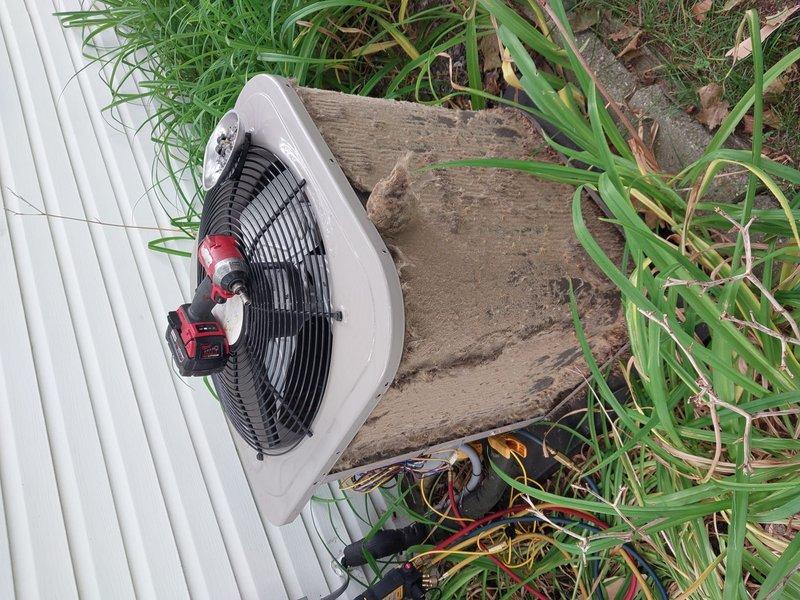 Responded to service call for 4-year-old air conditioning system located in basement laundry room requiring maintenance tune-up. Performed comprehensive system inspection of outdoor condenser unit and components. Inspected condenser coils, fan motor assembly, and electrical connections. Cleaned condenser coils and removed debris from unit exterior and surrounding area. Verified fan operation and checked refrigerant lines for proper insulation and connections. Conducted visual assessment of unit mounting platform and clearance requirements. System evaluated for operational efficiency and cooling performance. All components found to be functioning within normal parameters following tune-up service.