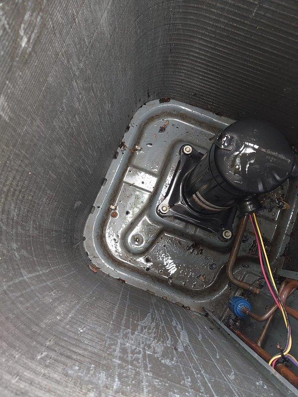 Performed complimentary second opinion evaluation of existing air conditioning system at homeowner's request to assess recommendations provided by another contractor. Conducted thorough visual inspection of outdoor condensing unit, noting significant accumulation of dust and debris restricting airflow through condenser coil fins. Examined indoor evaporator unit components including condensate drain pan and pump assembly, observing rust formation, water staining, and debris buildup in drain pan indicating potential drainage concerns. Documented current equipment condition through photographs for homeowner review. Provided professional assessment of system maintenance needs and discussed replacement options for consideration.