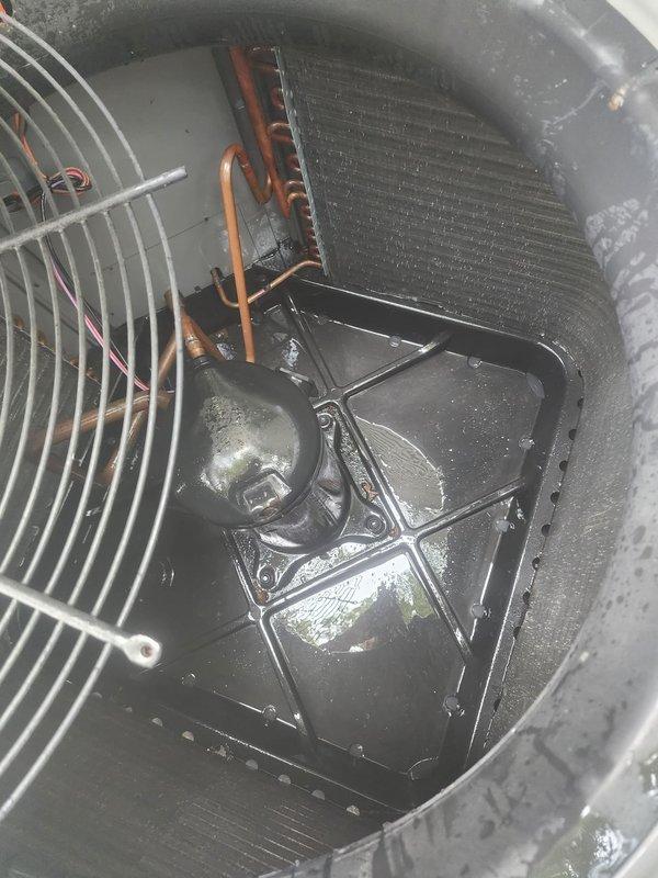 Completed routine air conditioning maintenance and tune-up on outdoor condensing unit. Inspected evaporator coil, compressor, refrigerant lines, and blower assembly; verified normal condensation in drain pan and confirmed all components operating within specifications. Unit tested and left in proper working condition.