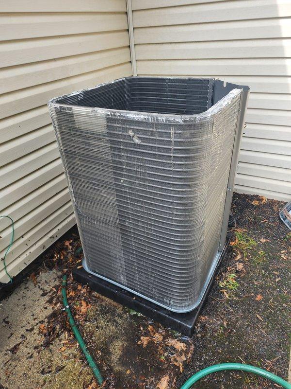 Completed annual AC maintenance visit under DTE rebate program. Performed comprehensive inspection of outdoor condensing unit, including examination of condenser coils, compressor motor, electrical connections, and refrigerant lines. Unit found in good operating condition with clean, intact coil fins and properly functioning components. Documented equipment condition with photographs for rebate program compliance.