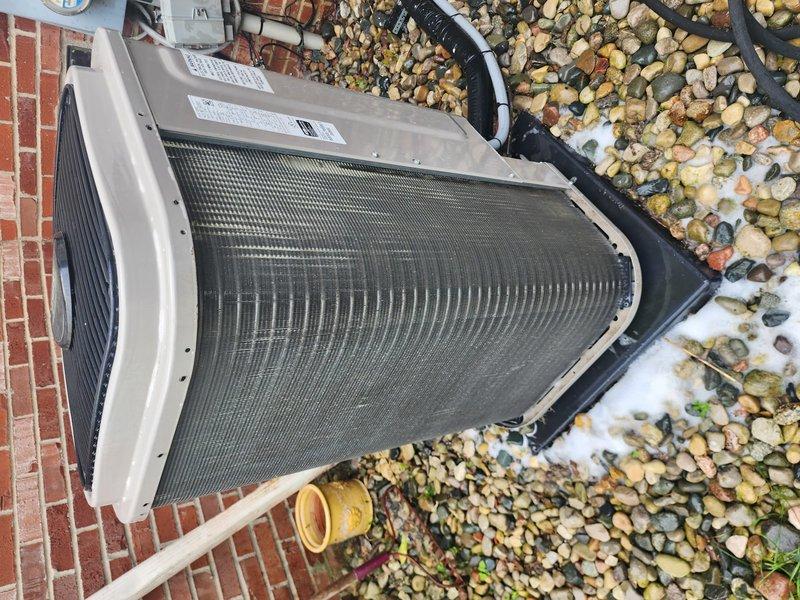 Performed routine preventive maintenance on residential air conditioning system. Inspected outdoor condensing unit, verified proper operation of compressor and condenser fan, checked refrigerant levels at service ports, and cleaned condenser coils. Unit found in good operating condition with no deficiencies noted.