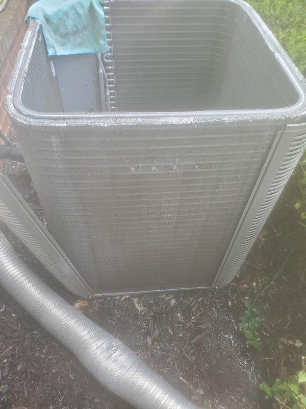 Completed routine cooling season maintenance inspection on residential air conditioning system. Performed comprehensive 3-5 ton unit service including inspection of outdoor condenser components, refrigerant line connections, compressor operation, electrical connections, and mounting hardware. All system components found in proper working order with no deficiencies noted.
