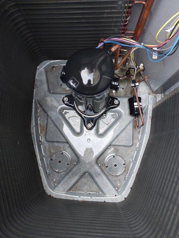 Completed preventative maintenance inspection on residential cooling system. Performed visual examination of outdoor condenser unit, documenting equipment condition including compressor assembly, refrigerant line connections, and electrical terminations. Unit operational with all components functioning within normal parameters at time of service.
