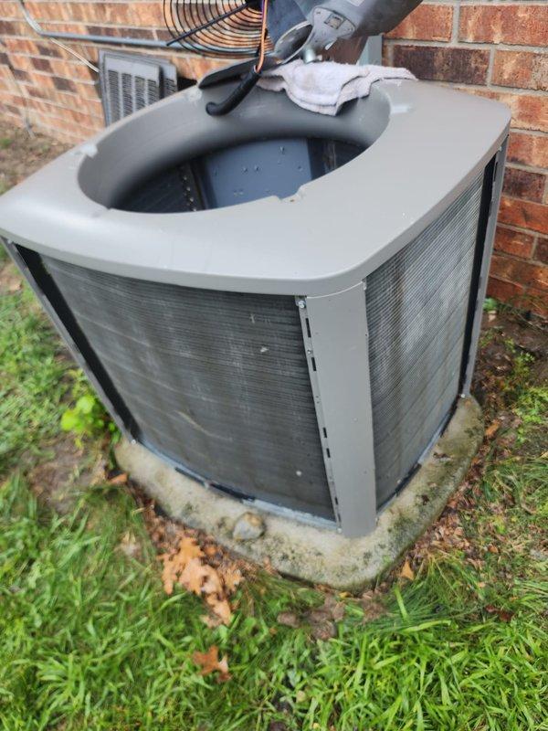 Completed preventive maintenance inspection on residential air conditioning system under Worry Free Service Agreement. Performed comprehensive assessment of outdoor condensing unit, including inspection of compressor assembly, refrigerant lines, electrical connections, and condenser coil. Unit shows normal operational wear with compressor exhibiting surface oxidation consistent with age, though all components remain functional and system is operating within acceptable parameters.
