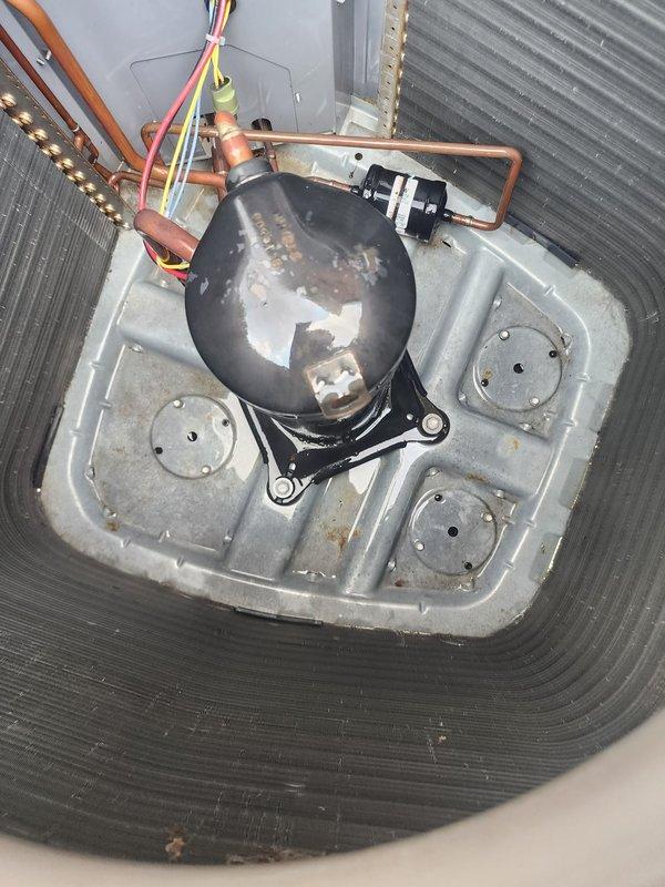 Completed preventive maintenance inspection on residential air conditioning system under Worry Free Service Agreement. Performed comprehensive assessment of outdoor condensing unit, including inspection of compressor assembly, refrigerant lines, electrical connections, and condenser coil. Unit shows normal operational wear with compressor exhibiting surface oxidation consistent with age, though all components remain functional and system is operating within acceptable parameters.