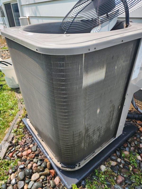 Completed AC maintenance 3-5 on residential split system. Inspected outdoor condenser unit and indoor compressor assembly, verified all refrigerant lines and connections secure, and documented equipment condition with photos showing normal operational wear patterns.