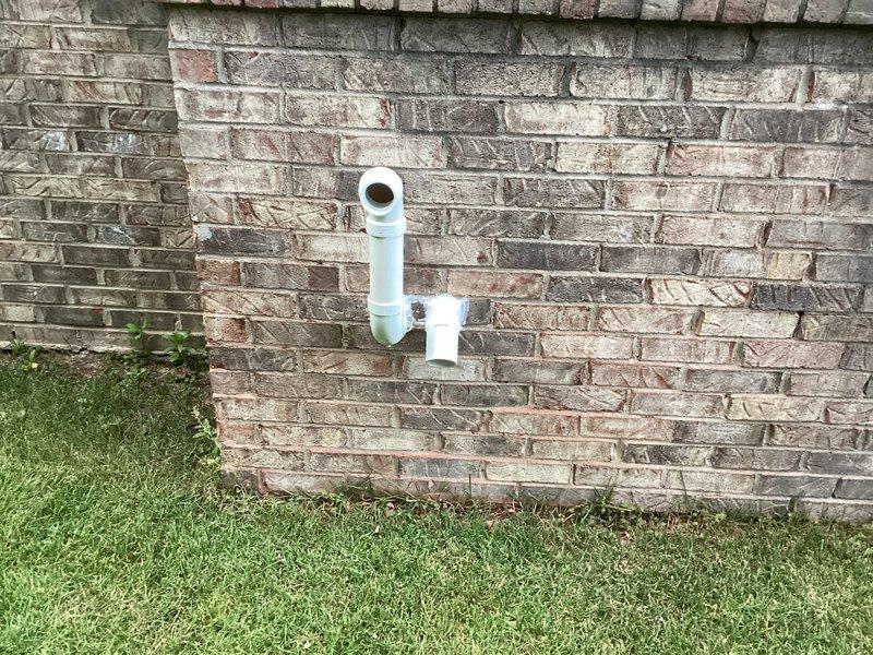 Completed full HVAC system installation including Lennox furnace, air conditioner, humidifier, and S40 thermostat. Installed exterior condensate drain line with proper PVC routing along brick foundation and interior drainage system connected to floor drain in mechanical room. All equipment commissioned, tested, and verified operational with payment collected upon completion.
