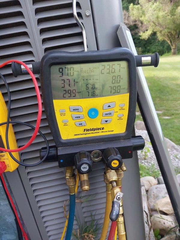 # HVAC Service Report

Responded to no-cool call on 10+ year old air conditioning system with reported fan motor failure. Upon arrival, confirmed outdoor fan motor was not operating. Connected manifold gauges and performed system diagnostics on R-410A unit. Measured operating pressures and temperatures to assess overall system condition and verify refrigerant charge levels. System displayed suction temperature of 38.4°F and discharge pressure of 232.9 PSI during testing. Superheat reading of 29.1°F and subcooling measurements indicated proper refrigerant charge once fan operation was restored. Completed comprehensive performance evaluation to ensure unit returned to normal cooling operation.
