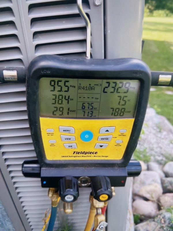 # HVAC Service Report

Responded to no-cool call on 10+ year old air conditioning system with reported fan motor failure. Upon arrival, confirmed outdoor fan motor was not operating. Connected manifold gauges and performed system diagnostics on R-410A unit. Measured operating pressures and temperatures to assess overall system condition and verify refrigerant charge levels. System displayed suction temperature of 38.4°F and discharge pressure of 232.9 PSI during testing. Superheat reading of 29.1°F and subcooling measurements indicated proper refrigerant charge once fan operation was restored. Completed comprehensive performance evaluation to ensure unit returned to normal cooling operation.