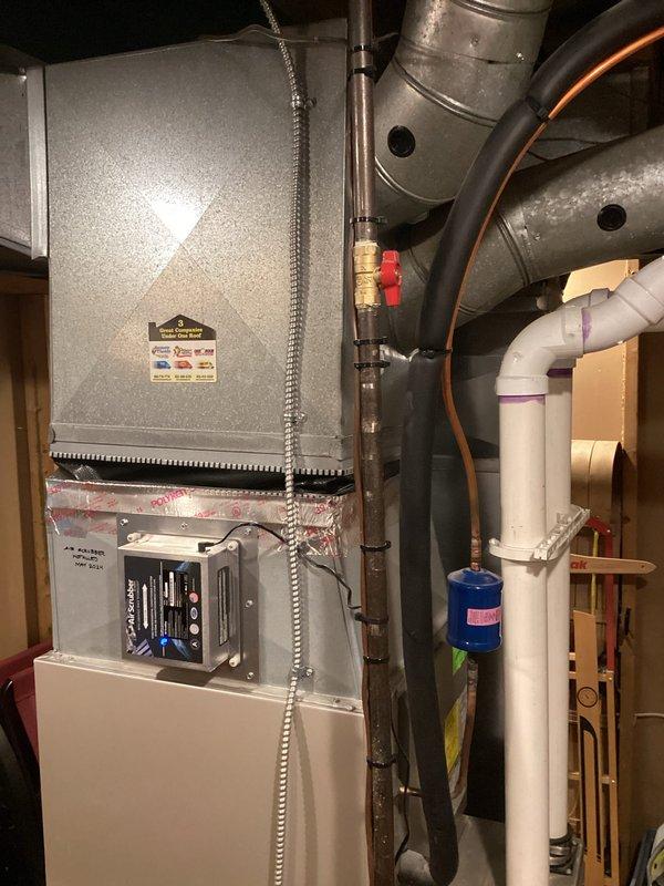 Provided estimate for complete HVAC system replacement of non-operational 10-year-old air conditioning unit and air handler located in basement utility area. Assessed existing installation including ductwork, refrigerant lines, PVC drainage system, and electrical connections to determine scope of replacement work. Documented current system configuration and discussed equipment options with property owner for upcoming installation scheduled between 11:00 AM and 1:00 PM.