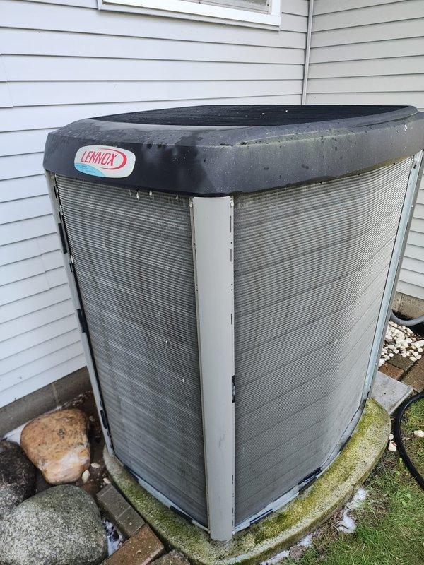 Completed preventive maintenance service on residential Lennox air conditioning system. Performed comprehensive inspection of outdoor condenser unit including electrical connections, contactors, and control wiring, verified all terminal connections were secure at the contactor assembly, and documented equipment condition with unit showing normal operational wear consistent with regular use.