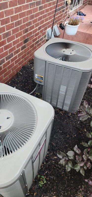 Completed preventive maintenance on dual residential air conditioning system. Performed comprehensive inspection of both outdoor condenser units, verified proper operation of compressors and fan motors, checked refrigerant levels, and cleaned condenser coils to ensure optimal heat transfer efficiency. Both units found in good working condition with no immediate service needs identified.