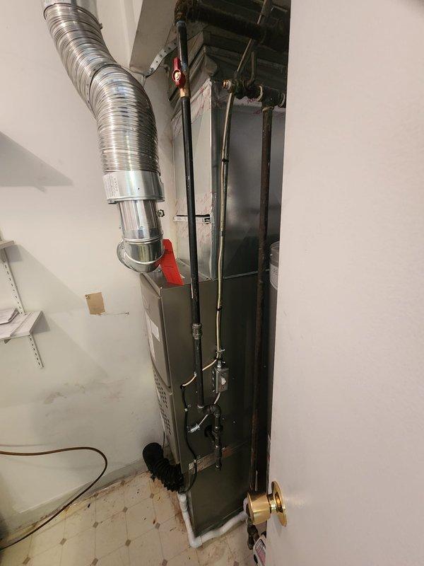 Completed full HVAC system replacement including installation of new Lennox 80% efficiency downflow furnace and air conditioning system. Removed existing equipment and old humidifier per sales specifications. Installed furnace unit with proper venting, configured flexible aluminum ductwork connections, and established all necessary condensate drainage lines with PVC piping. System tested and verified operational with all safety controls functioning properly.