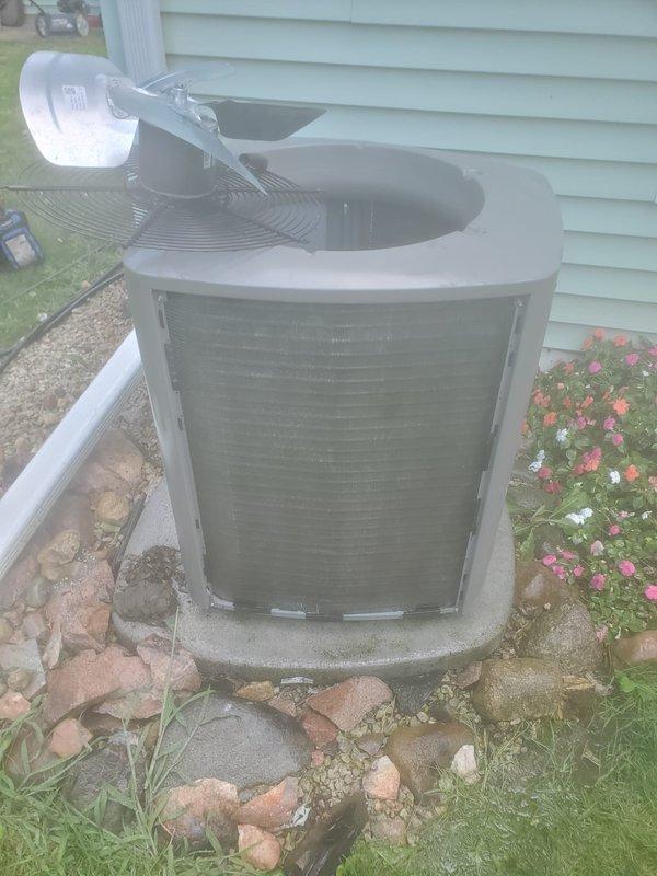 Completed comprehensive cooling season maintenance inspection on residential split system air conditioning unit. Performed visual inspection of indoor evaporator coil assembly, verified proper condensate drainage in drain pan, checked refrigerant line insulation integrity, and confirmed secure electrical connections at air handler. Inspected outdoor condenser unit, verified proper airflow through condenser coils, confirmed unit sitting level on concrete pad, and checked surrounding clearances meet manufacturer specifications for adequate ventilation and service access.