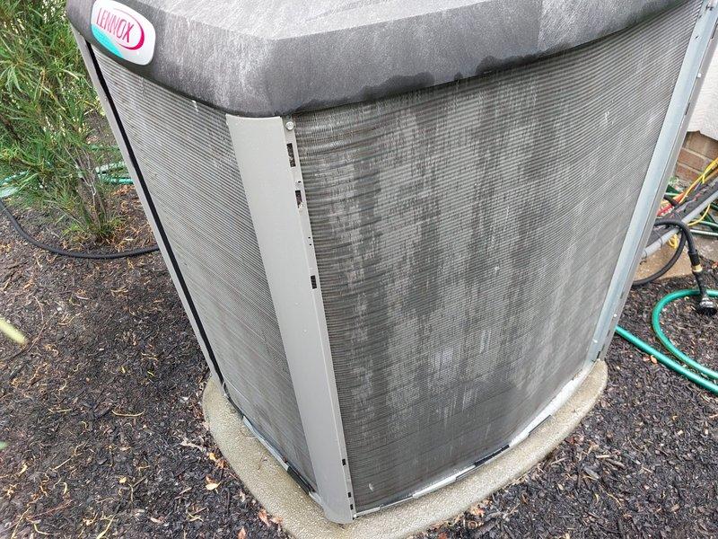 Completed preventive maintenance inspection on residential Lennox air conditioning system. Performed visual inspection of outdoor condenser unit, verified proper installation on concrete pad, and assessed overall equipment condition. Inspected interior blower assembly and ductwork components, noting normal wear patterns consistent with regular operation. Unit found to be in functional condition with all major components operational.