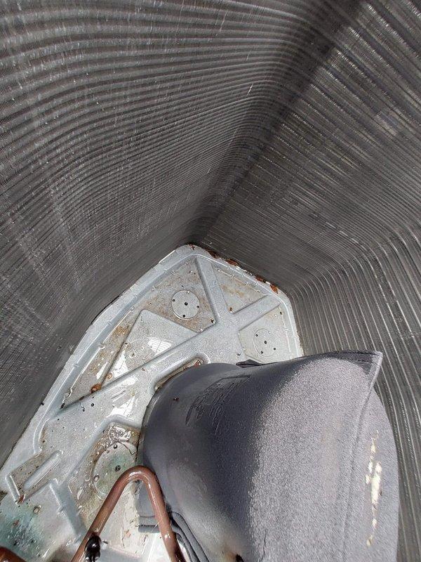 Completed preventive maintenance inspection on residential Lennox air conditioning system. Performed visual inspection of outdoor condenser unit, verified proper installation on concrete pad, and assessed overall equipment condition. Inspected interior blower assembly and ductwork components, noting normal wear patterns consistent with regular operation. Unit found to be in functional condition with all major components operational.