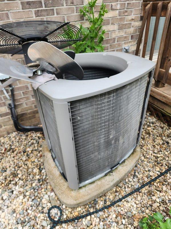 Completed scheduled cooling system maintenance and tune-up on residential air conditioning unit. Performed comprehensive inspection of outdoor condenser unit and indoor air handler components, verifying proper system operation throughout. Inspected condensate drain pan and float switch assembly, confirming proper drainage function and safety controls operational. System tested and found working properly with no deficiencies noted.