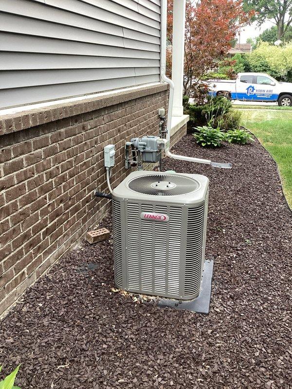 Provided estimate for replacement of non-operational 10-year-old Lennox air conditioning system with confirmed refrigerant leak. Unit located on exterior concrete pad with existing electrical disconnect and conduit infrastructure in place. Appointment scheduled after 5pm per customer availability requirements.