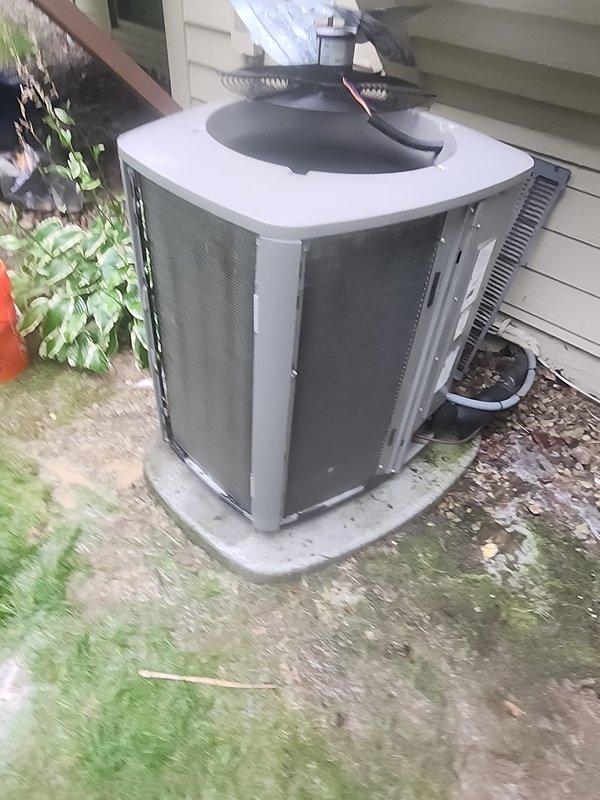 Completed seasonal cooling maintenance and tune-up on residential air conditioning system. Unit operational and performing within normal parameters. Inspected condenser unit exterior components, verified refrigerant line connections, examined electrical wiring and connections, and assessed internal compressor and evaporator coil condition. All mechanical and electrical components functioning properly with no deficiencies noted at time of service.