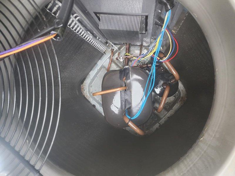 Completed seasonal cooling maintenance and tune-up on residential air conditioning system. Unit operational and performing within normal parameters. Inspected condenser unit exterior components, verified refrigerant line connections, examined electrical wiring and connections, and assessed internal compressor and evaporator coil condition. All mechanical and electrical components functioning properly with no deficiencies noted at time of service.