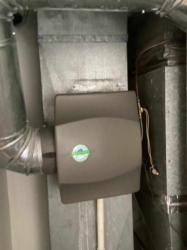 Conducted comprehensive assessment of existing 26-year-old HVAC system for complete replacement estimate, including outdoor air conditioning unit and indoor furnace located in downstairs utility room. Current air conditioning system not functioning properly while furnace remains operational, though both units have reached end of expected service life. Documented existing equipment configuration including ductwork, humidifier installation, and current system layout to provide accurate replacement specifications and ensure proper sizing for new equipment installation.