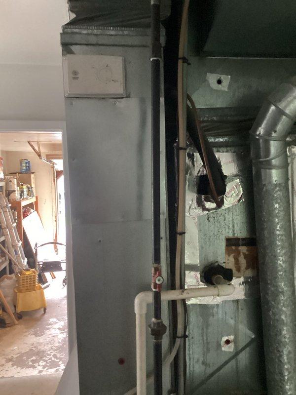 Conducted comprehensive assessment of existing 26-year-old HVAC system for complete replacement estimate, including outdoor air conditioning unit and indoor furnace located in downstairs utility room. Current air conditioning system not functioning properly while furnace remains operational, though both units have reached end of expected service life. Documented existing equipment configuration including ductwork, humidifier installation, and current system layout to provide accurate replacement specifications and ensure proper sizing for new equipment installation.