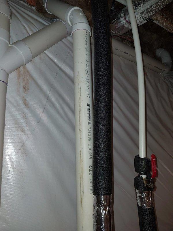 Responded to service call for hot water heater with pilot light that would not ignite. Upon arrival, inspected gas water heater and assessed pilot assembly and gas supply system. Verified proper gas flow to unit and examined thermocouple and pilot orifice for functionality. Successfully restored pilot light operation and confirmed burner ignition cycle. Tested temperature settings and adjusted controls per customer preference. Inspected associated plumbing connections and insulated pipes in overhead space to ensure system integrity. Unit left in proper working condition with pilot light burning steadily and main burner cycling correctly.