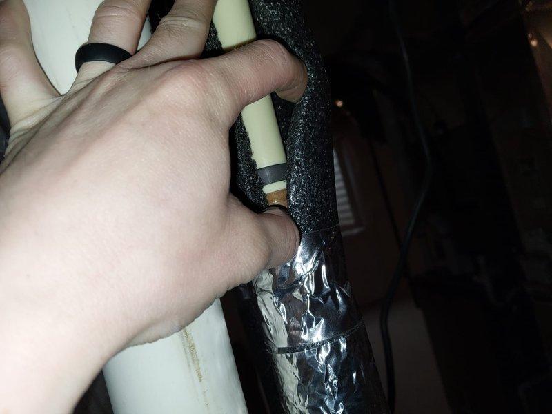 Responded to service call for hot water heater with pilot light that would not ignite. Upon arrival, inspected gas water heater and assessed pilot assembly and gas supply system. Verified proper gas flow to unit and examined thermocouple and pilot orifice for functionality. Successfully restored pilot light operation and confirmed burner ignition cycle. Tested temperature settings and adjusted controls per customer preference. Inspected associated plumbing connections and insulated pipes in overhead space to ensure system integrity. Unit left in proper working condition with pilot light burning steadily and main burner cycling correctly.
