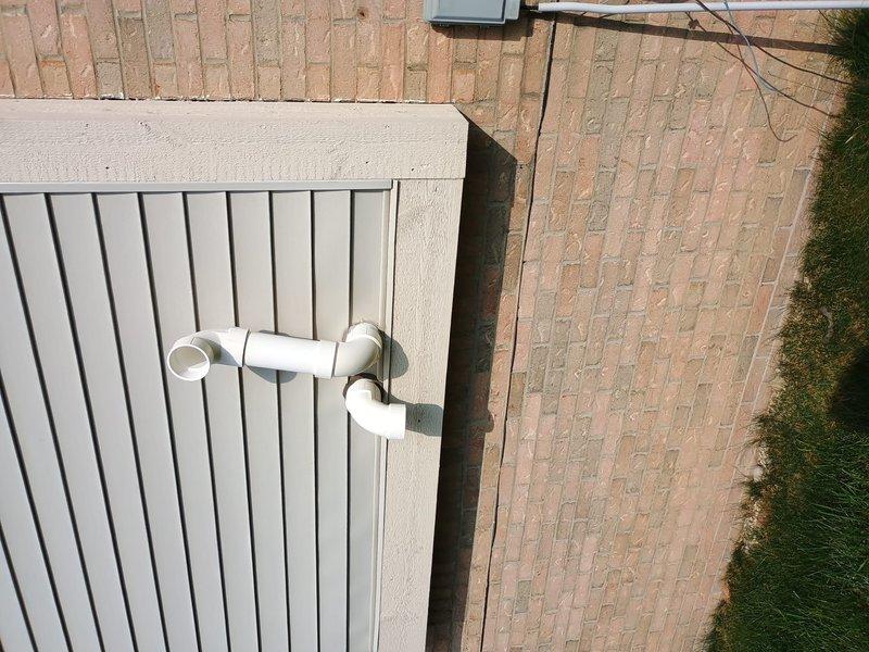 Completed full HVAC system installation including Lennox furnace, air conditioner, humidifier, and S40 thermostat. Installed outdoor condensing unit with refrigerant line set routed along exterior fence, established proper drainage system with PVC condensate lines, and mounted indoor furnace with integrated humidifier. Programmed and configured S40 smart thermostat for optimal system operation and verified all components functioning within manufacturer specifications.