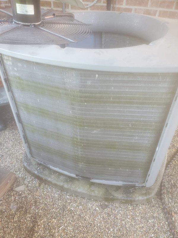 Completed preventive maintenance inspection on residential cooling system under Worry Free Service Agreement. During inspection, identified UV bulb requiring replacement with recommendation to service within 10-12 months. Documented exterior unit condition showing biological growth on cabinet panels and inspected internal components including compressor, refrigerant lines, electrical connections, and condenser coil, all of which are currently operational.