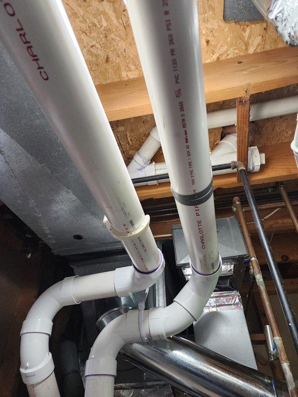 Completed full HVAC system installation including Lennox furnace, air conditioning unit, whole-home humidifier, and S40 smart thermostat. Installed new PVC venting system routed through ceiling joists with proper pitch and support, ensuring code-compliant exhaust and intake air pathways. Configured and programmed S40 thermostat for optimal system communication and efficiency settings. All equipment tested and operational upon completion.