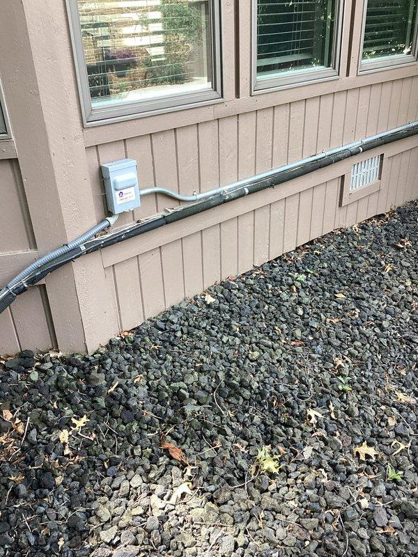 Completed comprehensive estimate for full HVAC system replacement and hot water tank installation. Assessed existing electrical infrastructure including breaker panel and exterior utility connections, documented current air conditioning circuit breaker configuration, and evaluated exterior conduit routing and foundation-level utility access points. Provided detailed replacement specifications for complete heating and cooling system upgrade along with water heater replacement recommendations.
